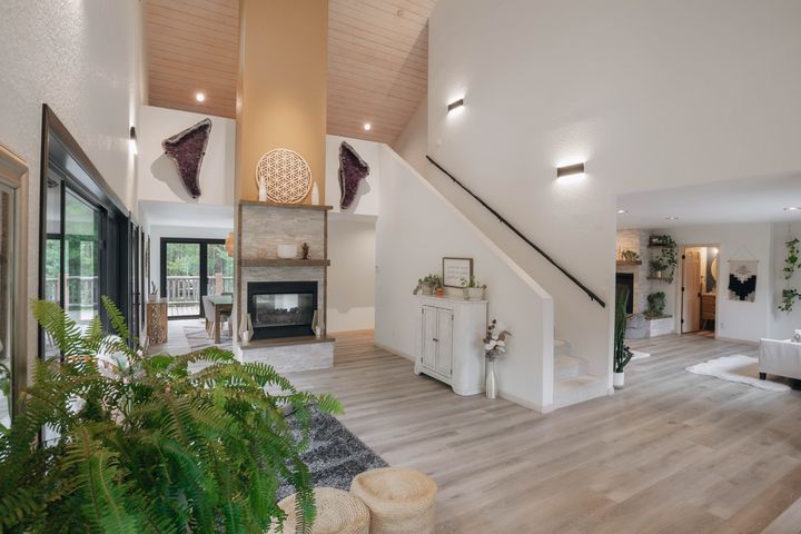 Two-story great room with Brazilian amethyst fireplace