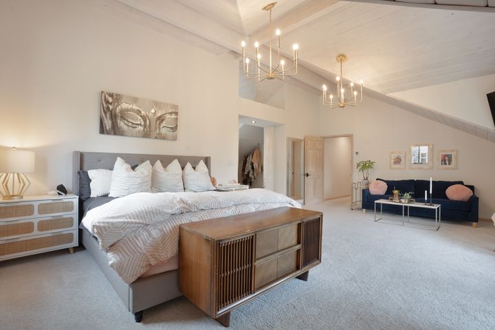 Primary suite with vaulted ceiling